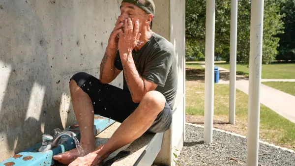 A man cools off with water