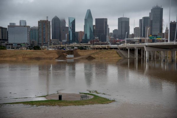 A seating area is visible in a flooded portion of the Trinity River near downtown Dallas on Aug. 22.