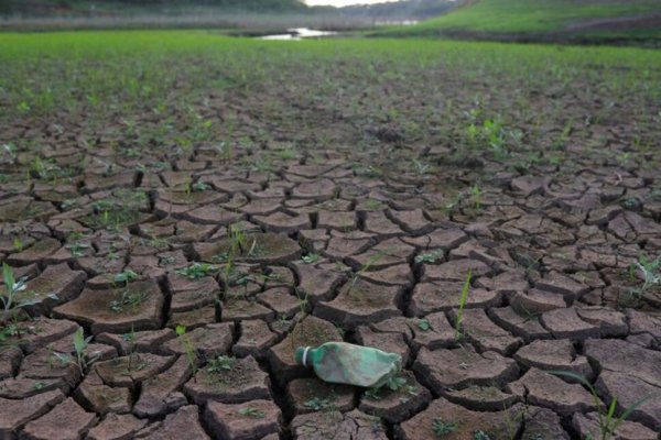 A crushed bottle is seen on the dry ground of the Jaguari dam, which is part of the Cantareira reservoir system, during a drought in Joanopolis, near Sao Paulo, Brazil, October 8, 2021.