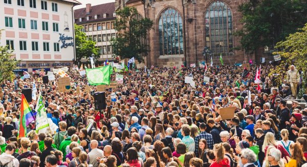 people demonstrating at a climate change rally in Germany