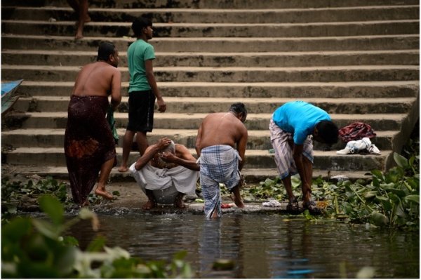 Residents of Matlab, Bangladesh, performing daily water-related tasks. Photo credit: Kriston Jae Bethel Photography