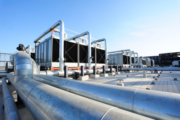 Cooling tower HVAC equipment on the roof of a building