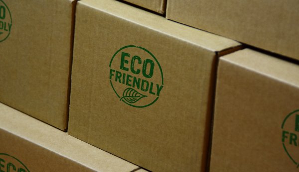 Cardboard boxes with eco-friendly labels printed on them