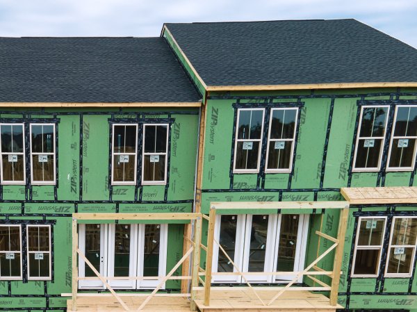 Taped plywood panels on a building that is under construction