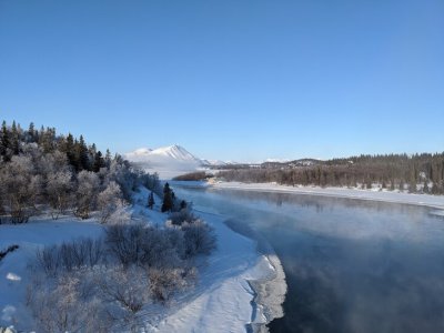 View from the Wood River Bridge near Aleknagic, Alaska. Built in 2015, the bridge connects the two sides of a community. Until then, the north shore, where the school as well as city and tribal government offices are located, was accessible only via boat in the summer or snow machine in the winter. Bridges are increasingly important in rural Alaska as climate change is causing rivers to freeze later, thaw earlier and form thinner ice, making them dangerous to cross.