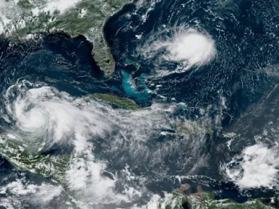 Hurricanes are shown crossing the Atlantic ocean