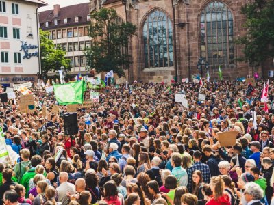 people demonstrating at a climate change rally in Germany