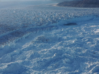 Meltwater drainage, break-away icebergs linked at shrinking Helheim Glacier | Penn State University