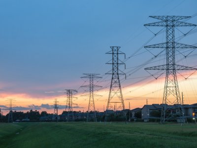 electrical transmission power lines at sunset