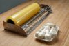 Close up of mushrooms on plastic tray packed in transparent cling film